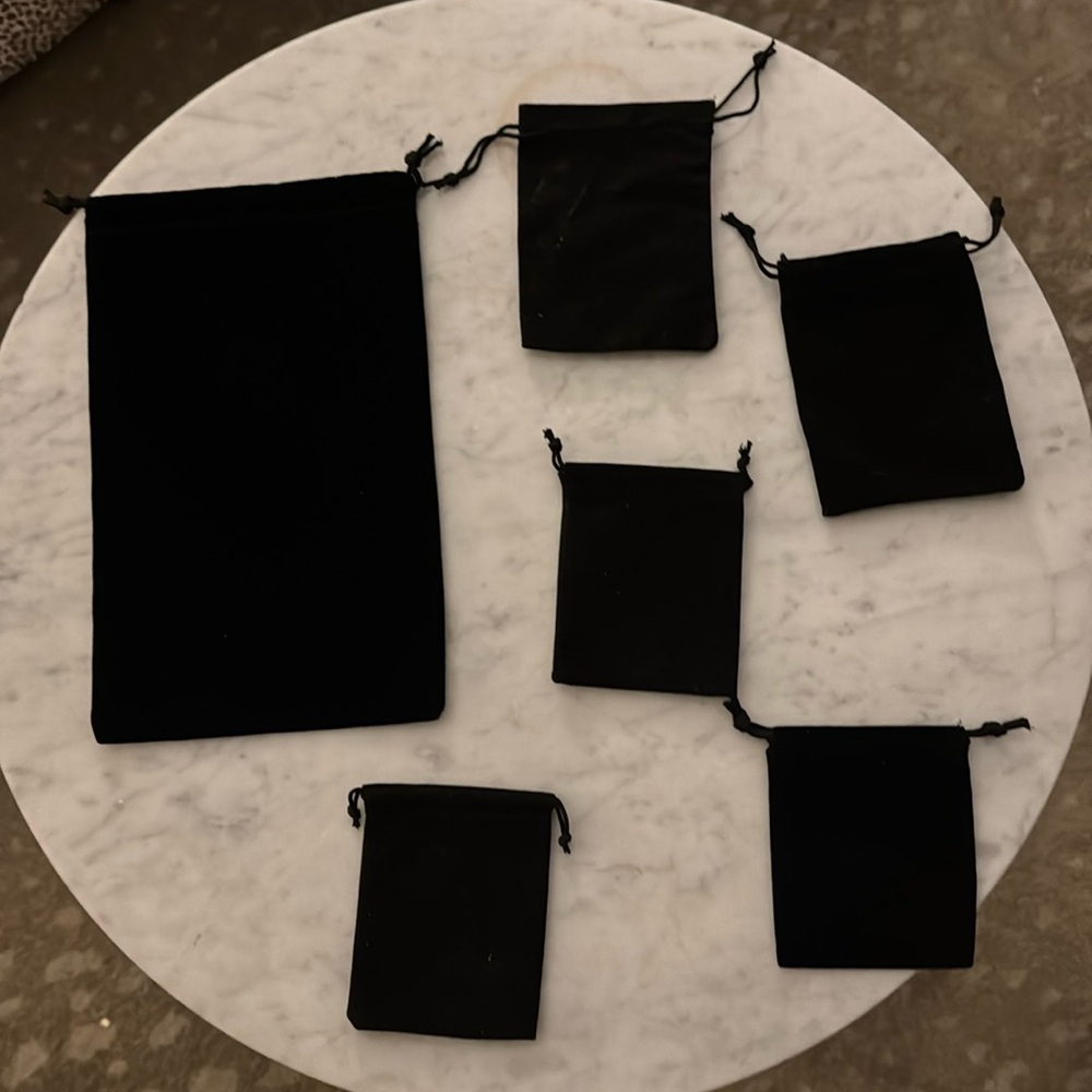 Velvet bags for jewelry or other items 
Six
